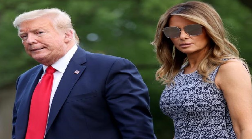 Donald Trump alongside his wife Melania Trump